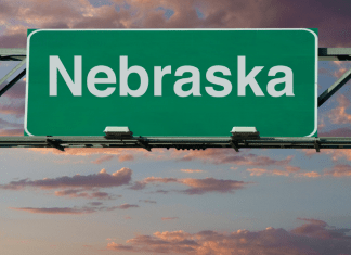 green nebraska road sign